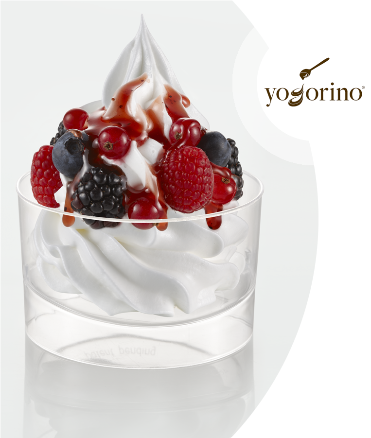 A Glass With Whipped Cream And Berries