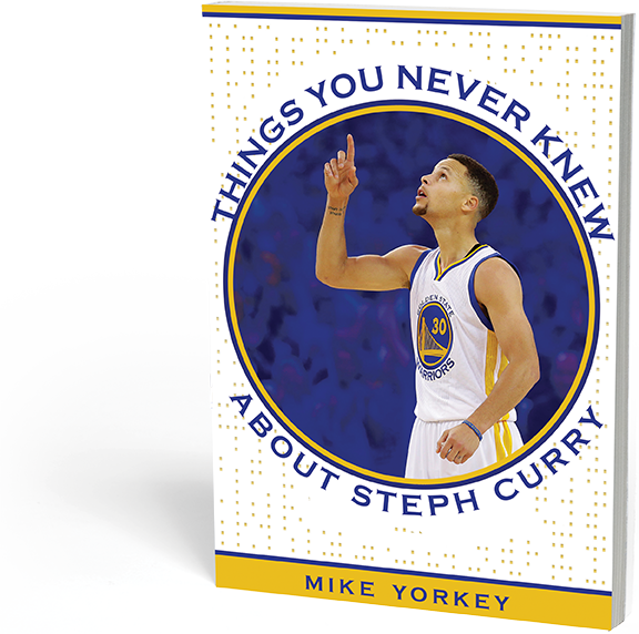 A Book With A Basketball Player Pointing Up