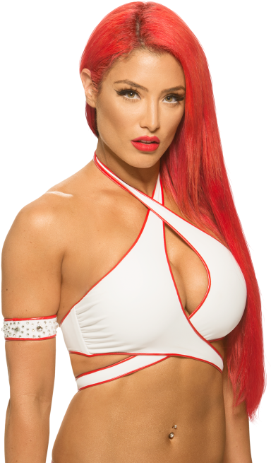 A Woman With Red Hair And A White Top