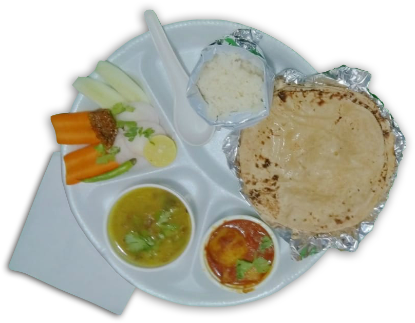 A Plate Of Food With A Spoon And A Fork