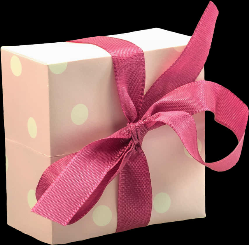 A White Box With A Pink Ribbon