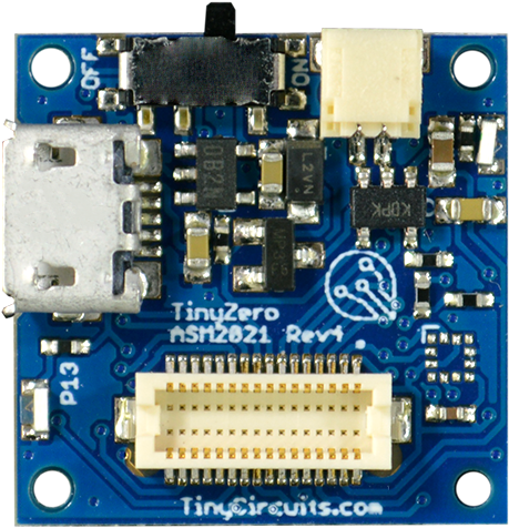 A Blue Circuit Board With White And Black Connectors