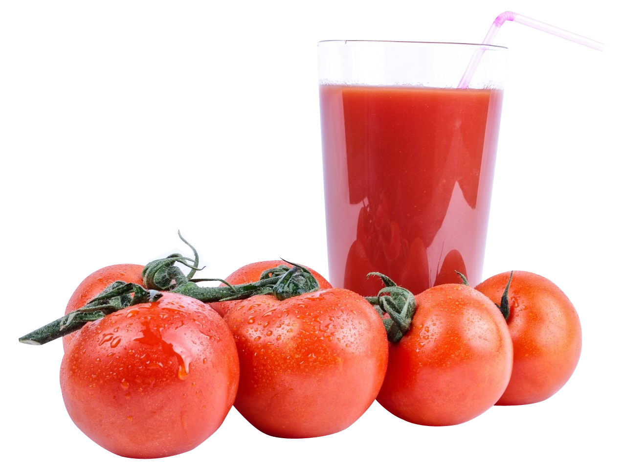 A Group Of Tomatoes Next To A Glass Of Juice