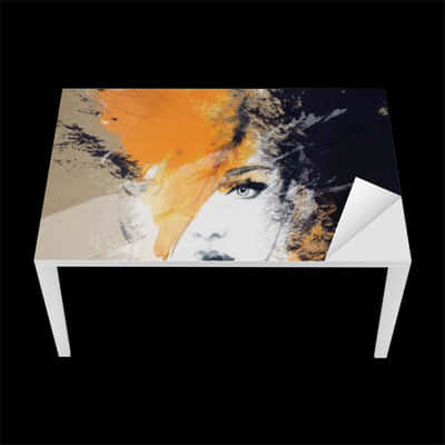 A Table With A Picture Of A Woman's Face