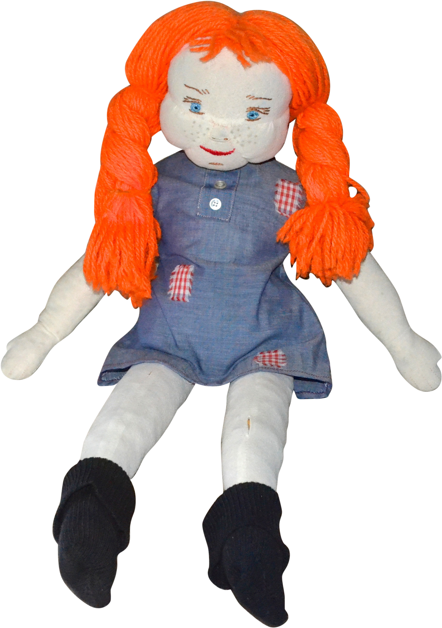 A Doll With Red Hair And Blue Dress