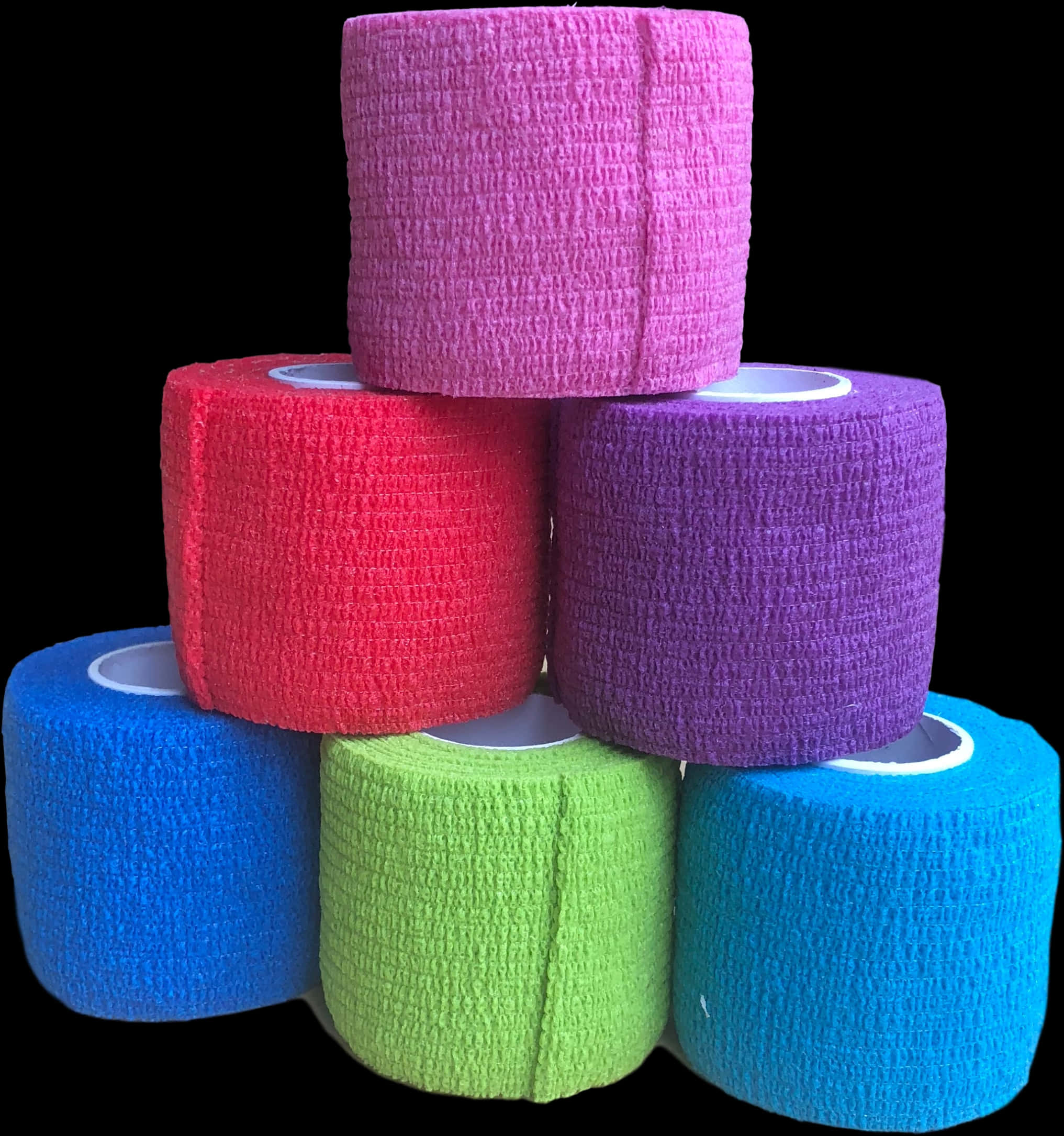 A Stack Of Rolls Of Different Colors