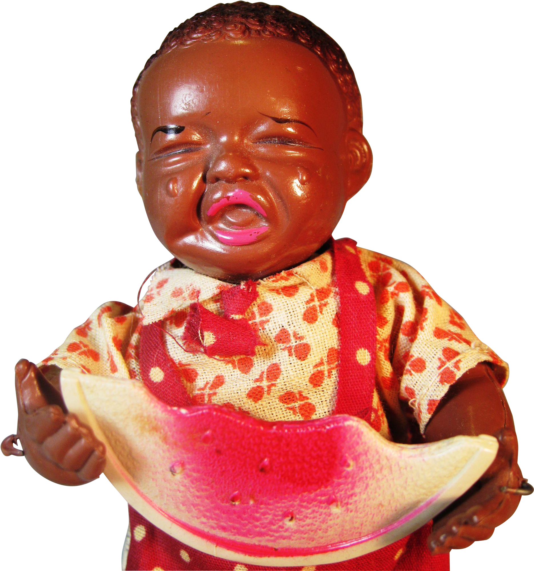 A Doll Holding A Watermelon