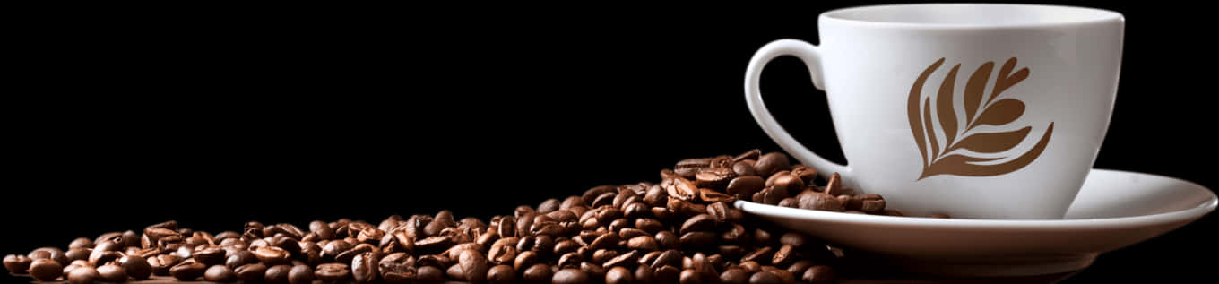 A Cup Of Coffee On A Pile Of Coffee Beans