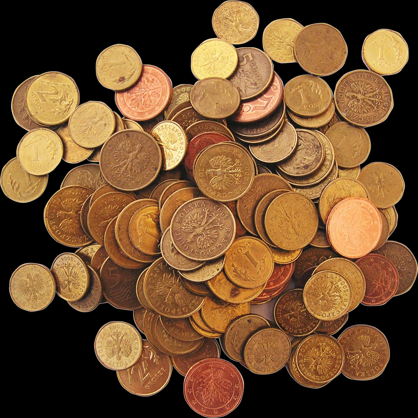 A Pile Of Coins On A Black Background