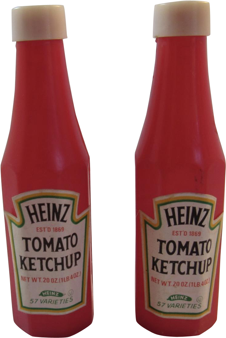 A Couple Of Ketchup Bottles