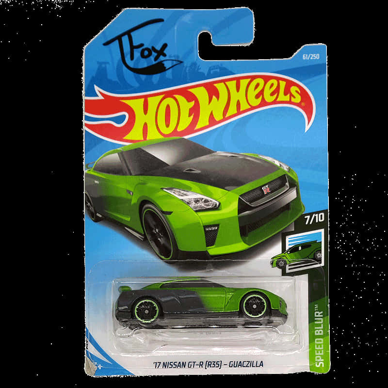 A Green And Black Toy Car In A Package
