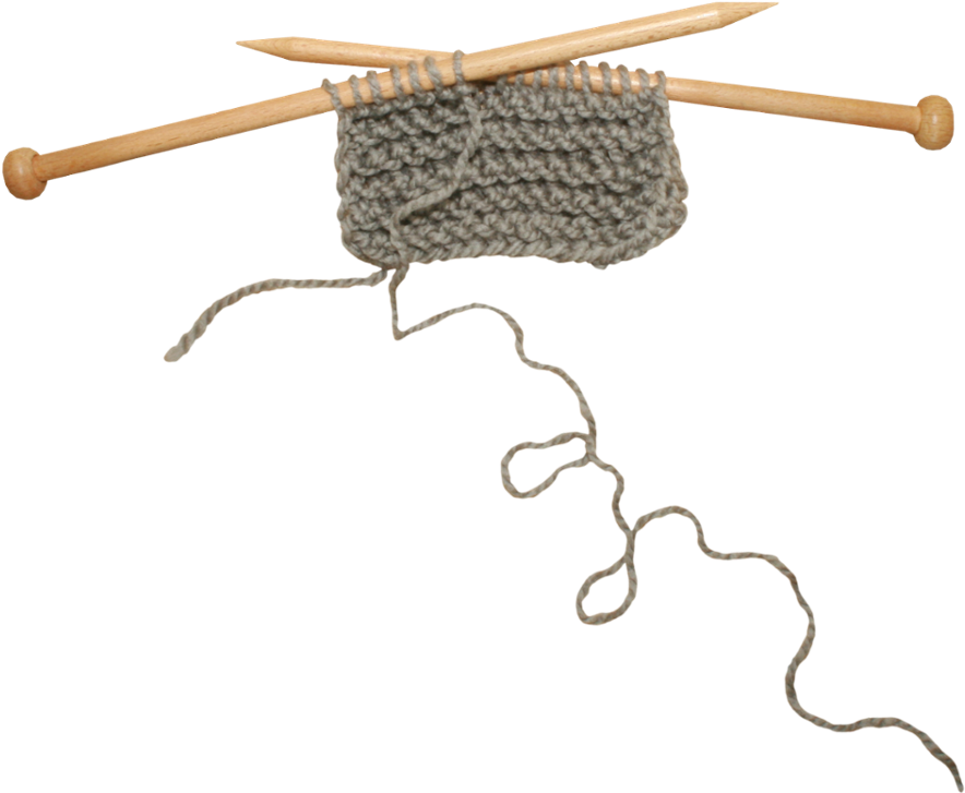 A Piece Of Yarn And Two Wooden Needles