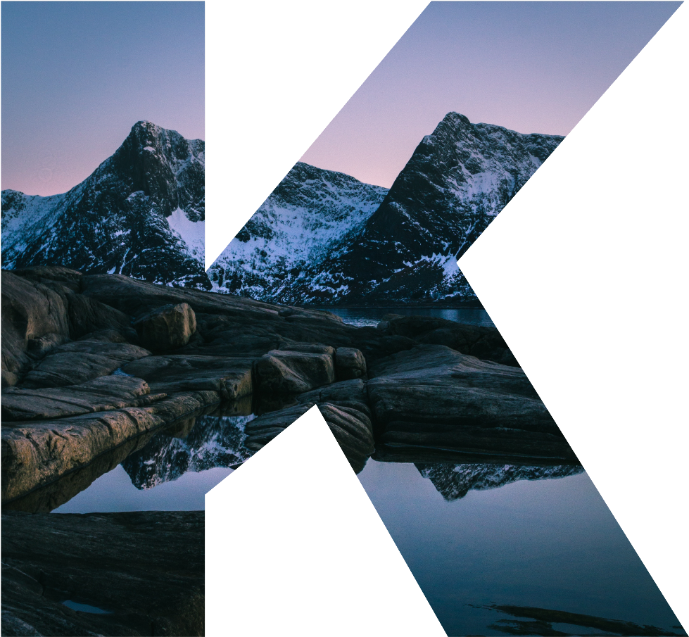 A Mountain Range With Snow And Water