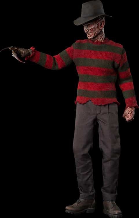 A Man In A Striped Sweater Holding A Knife