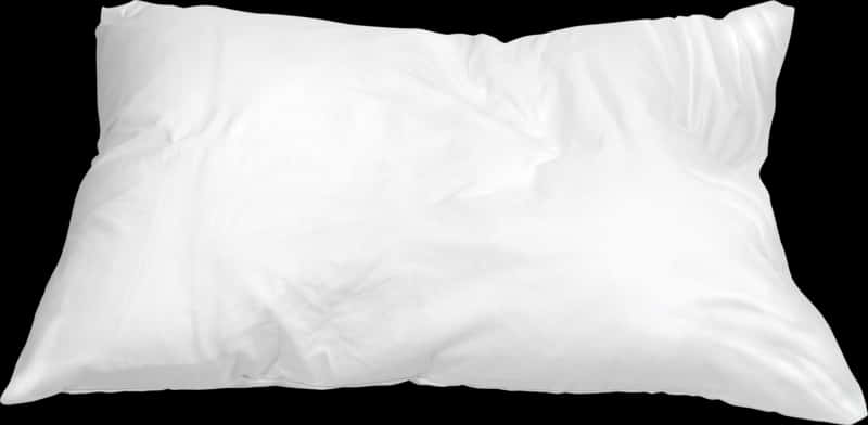 A White Pillow On A Black Background
