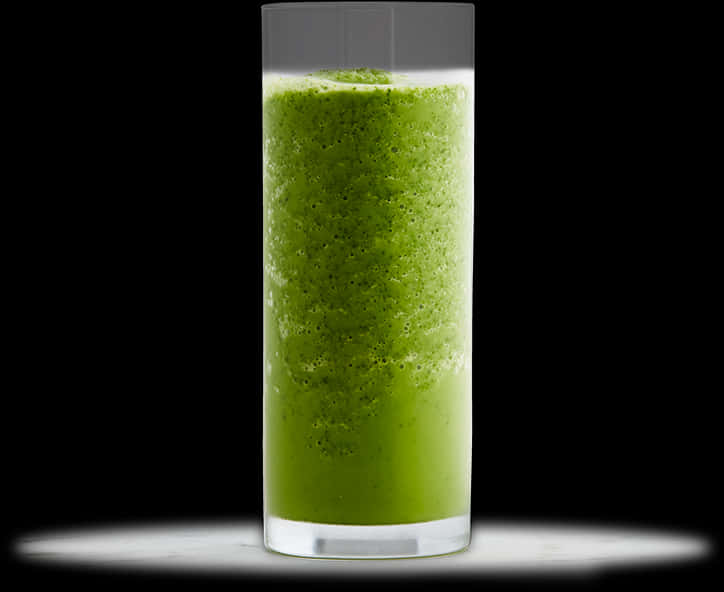 A Glass Of Green Liquid