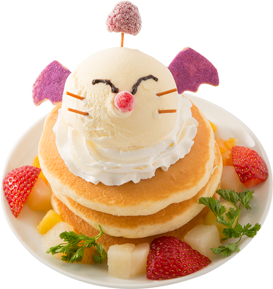 A Stack Of Pancakes With A Cat Face On Top