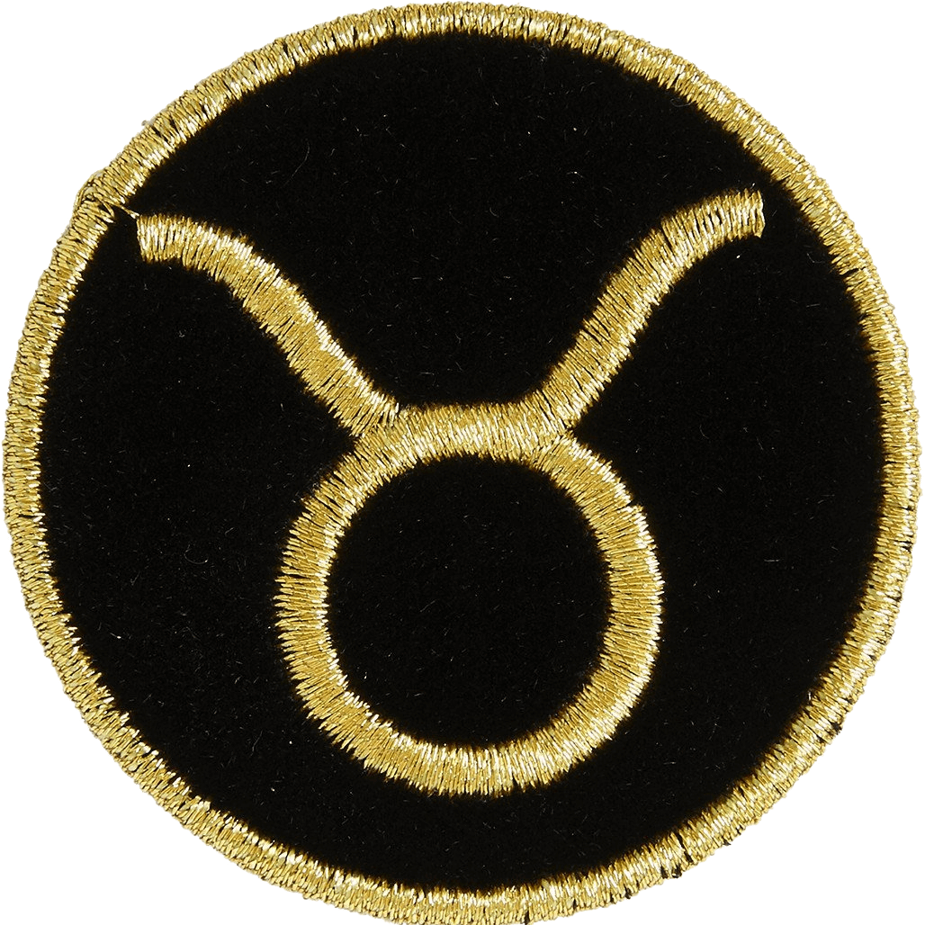 A Black And Gold Embroidered Symbol