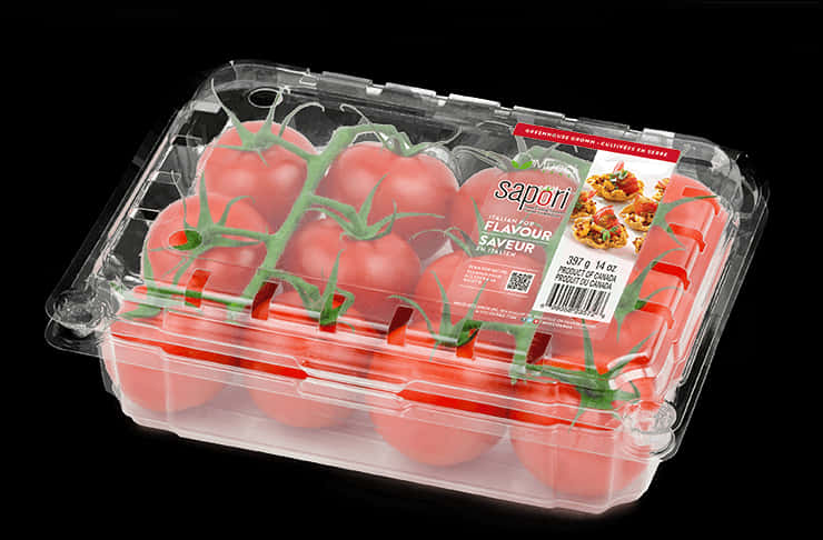 A Plastic Container Of Tomatoes