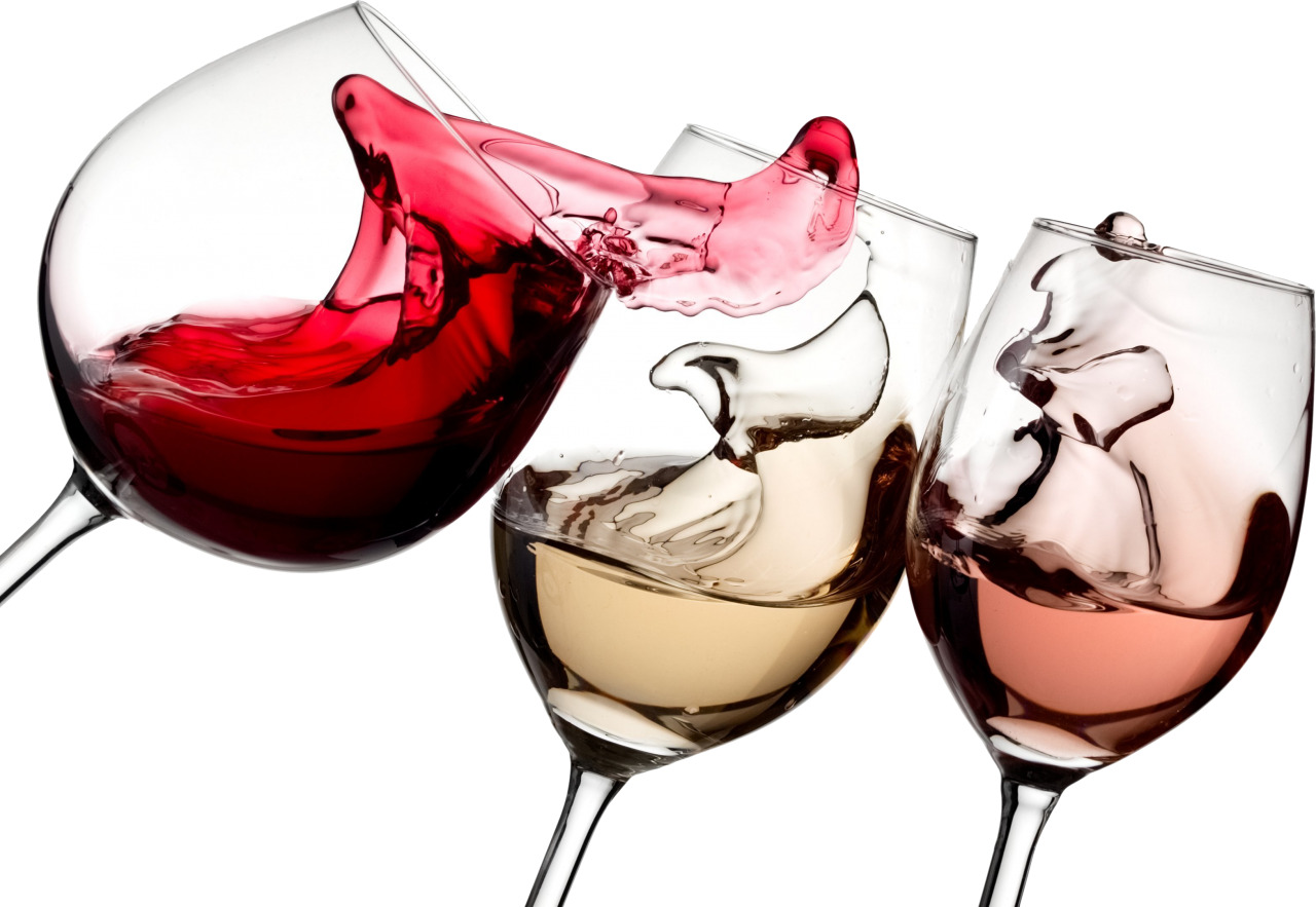 A Group Of Wine Glasses With Liquid Splashing