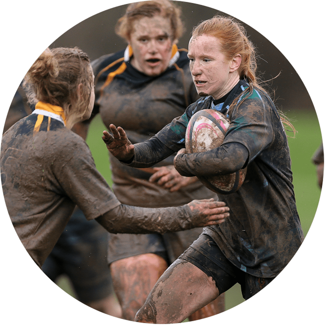 A Group Of Women Playing Rugby
