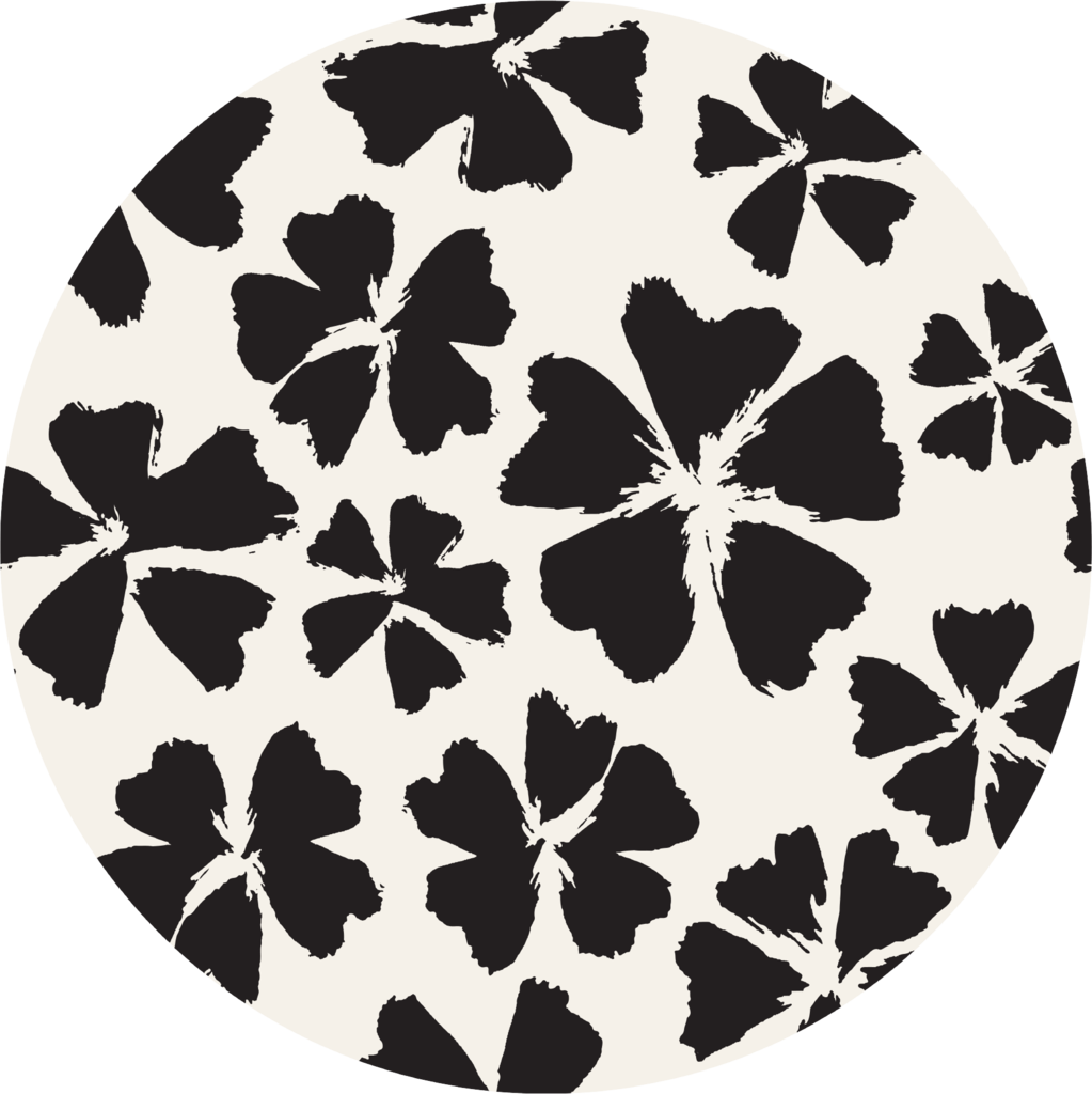 A Circle With Black And White Flowers