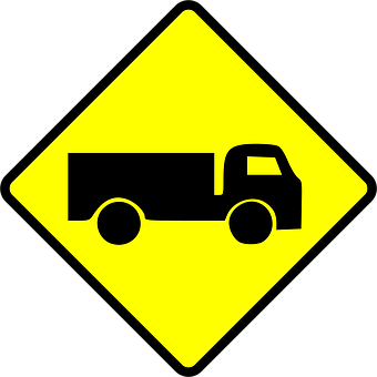 A Yellow Sign With A Truck On It