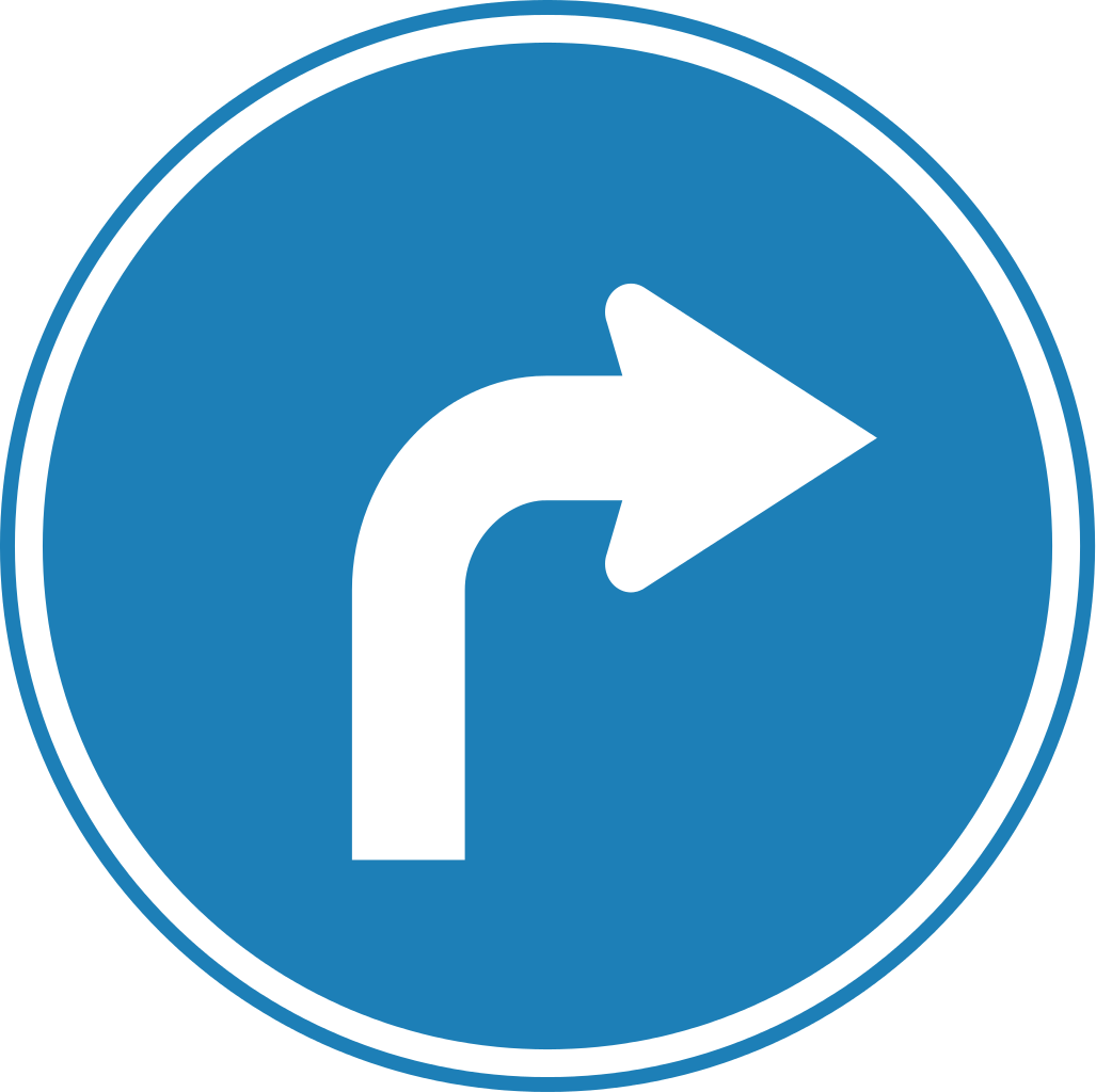 A Blue Sign With A White Arrow Pointing To The Left