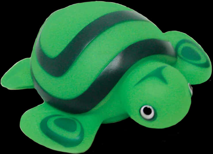 A Green Turtle Toy With Black Stripes