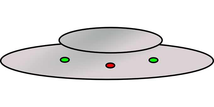 A White Object With Green And Red Dots