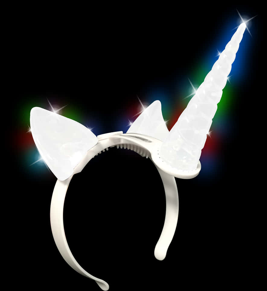A Headband With A Unicorn Horn And A Rainbow Light