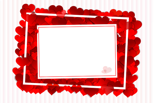 A White Rectangle With Red Hearts Around It