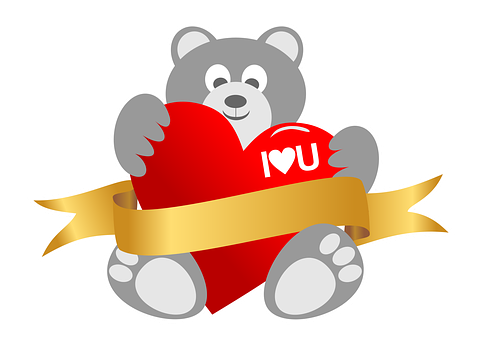 A Teddy Bear Holding A Heart