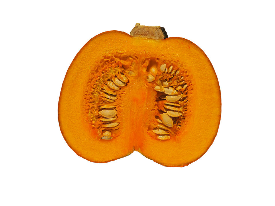 A Cut Pumpkin With Seeds