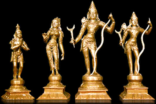 A Group Of Gold Statues