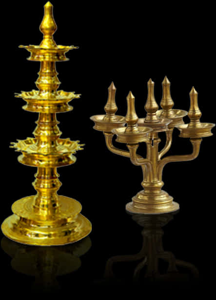 A Group Of Gold Candlesticks