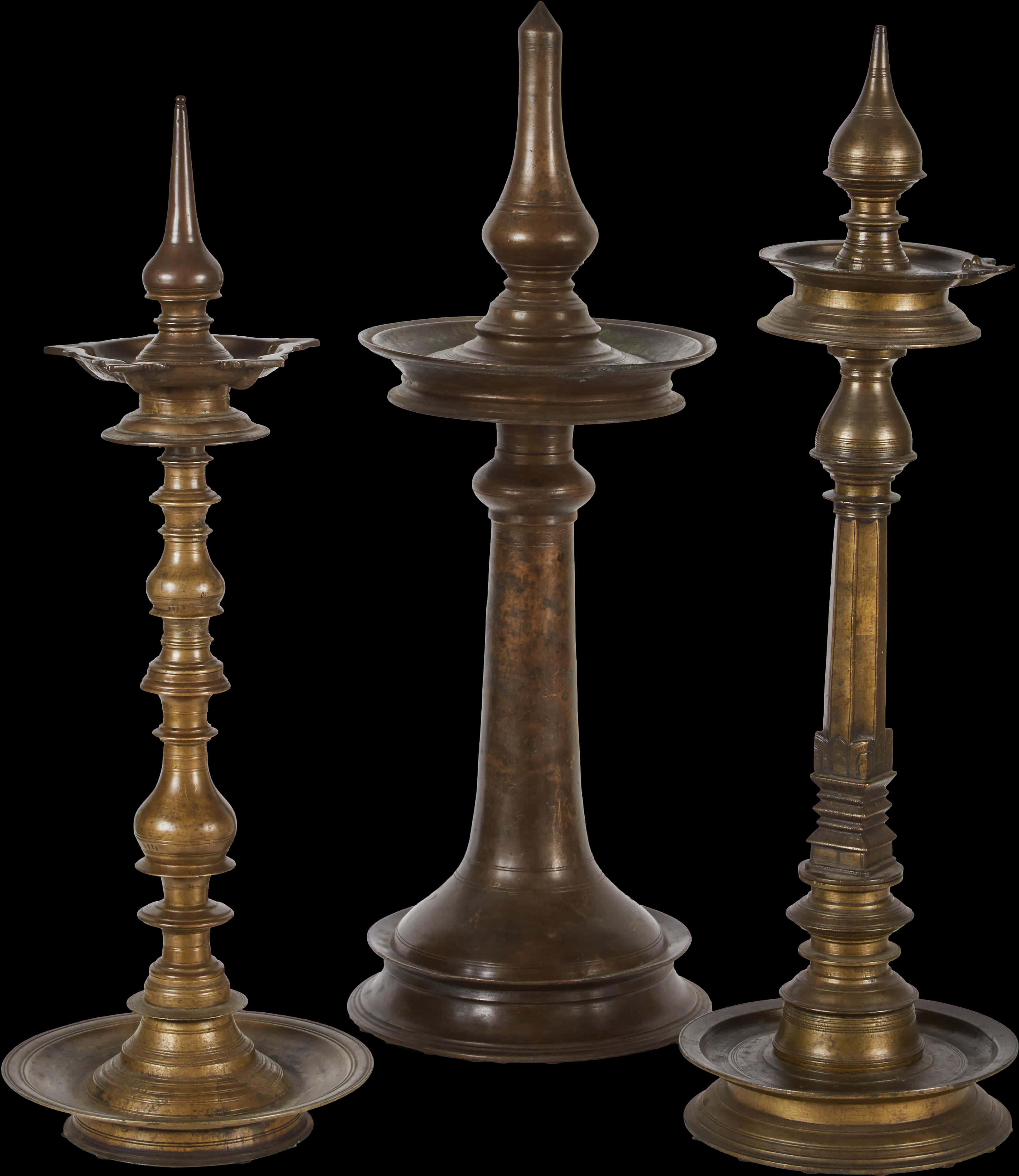 A Group Of Antique Candlesticks