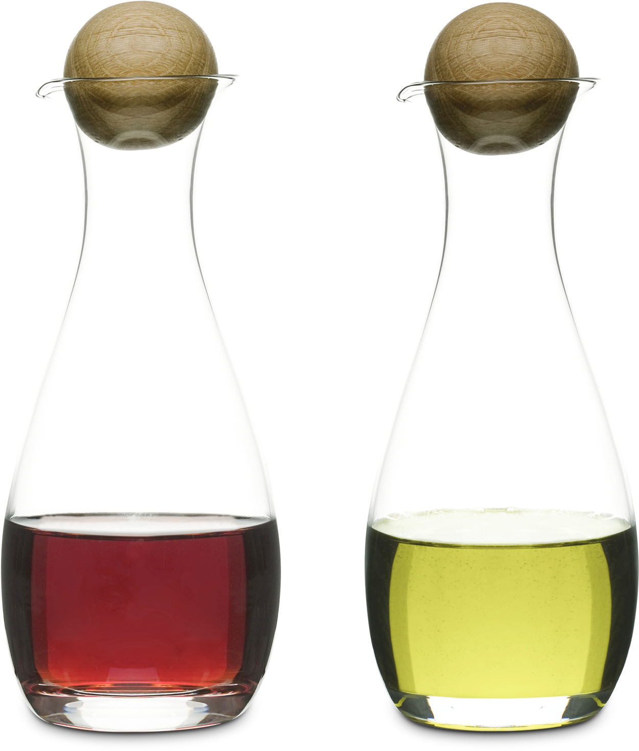 A Couple Of Glass Containers With Different Colored Liquid