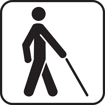A Black And White Sign With A Stick