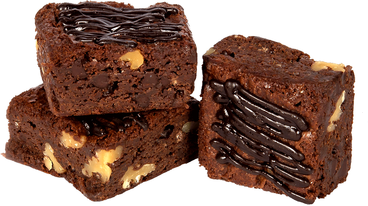 A Group Of Brownies With Chocolate Drizzled On Them
