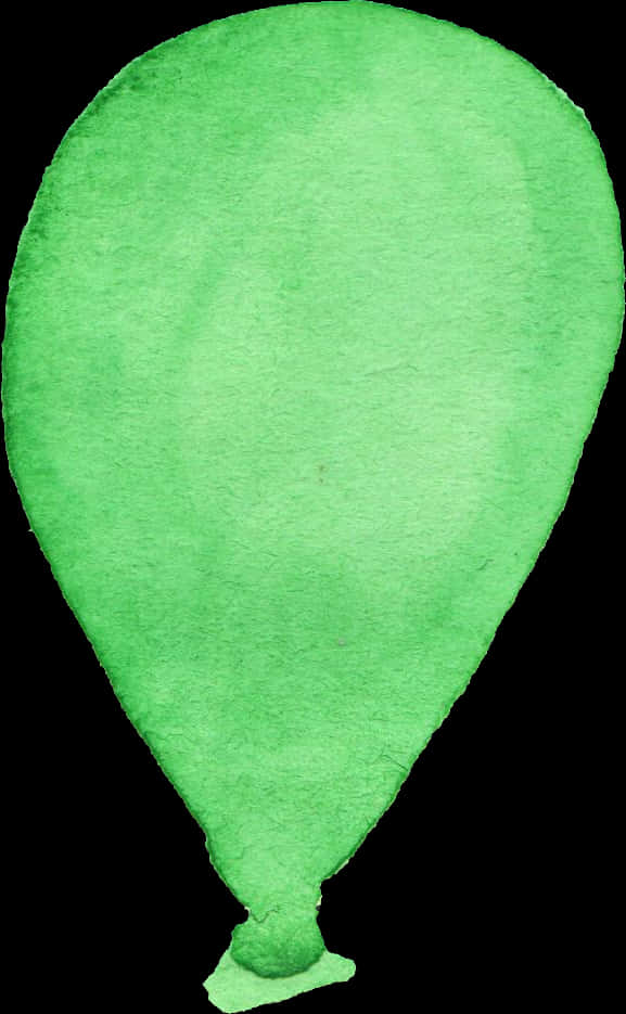 A Green Guitar Pick On A Black Background