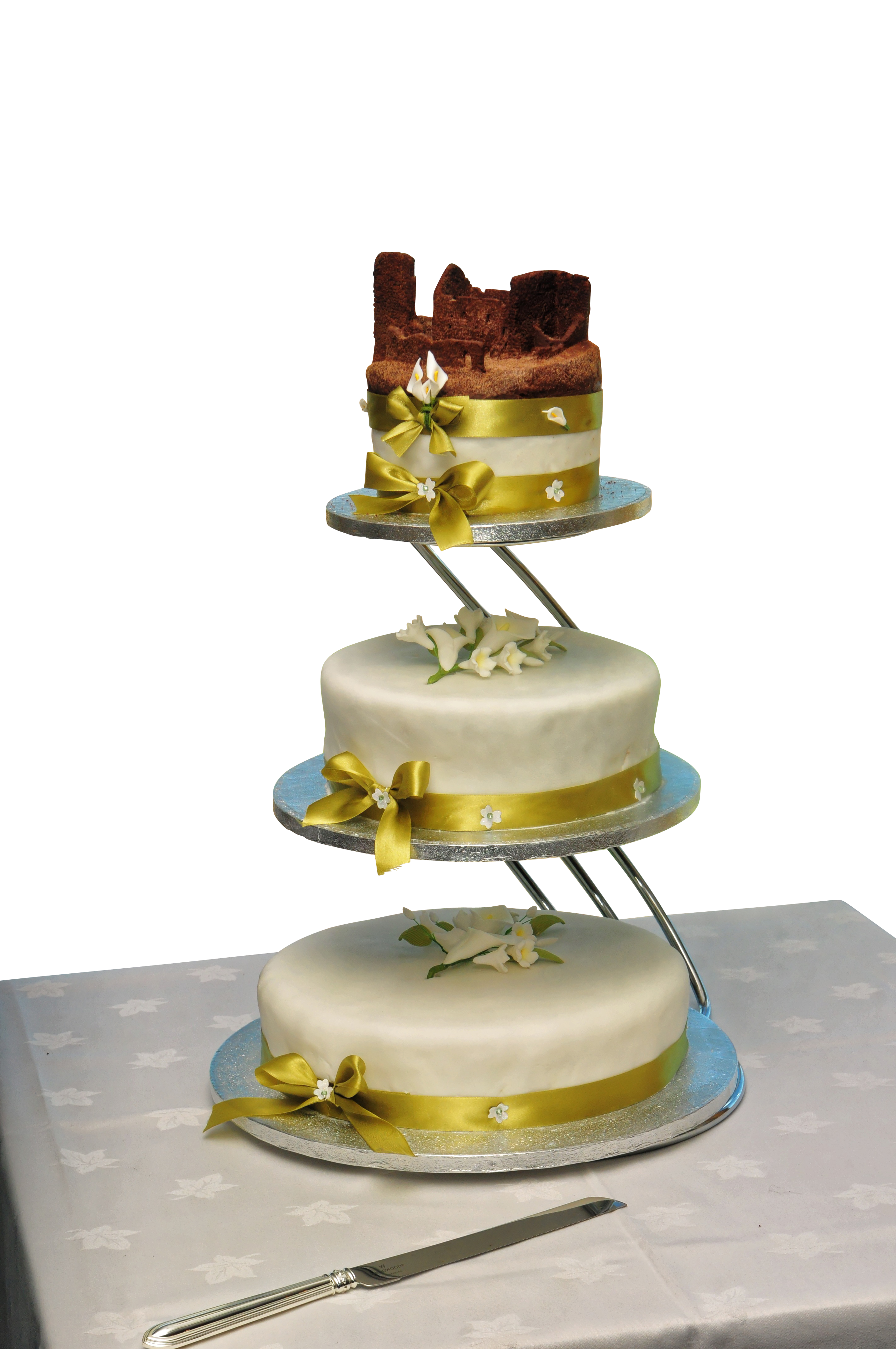 A Cake With A Gold Ribbon