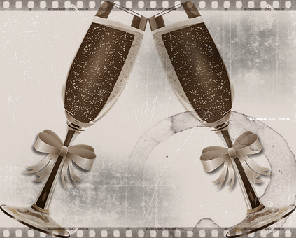 A Pair Of Champagne Glasses With Bows