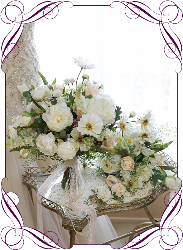A Bouquet Of White Flowers On A Table