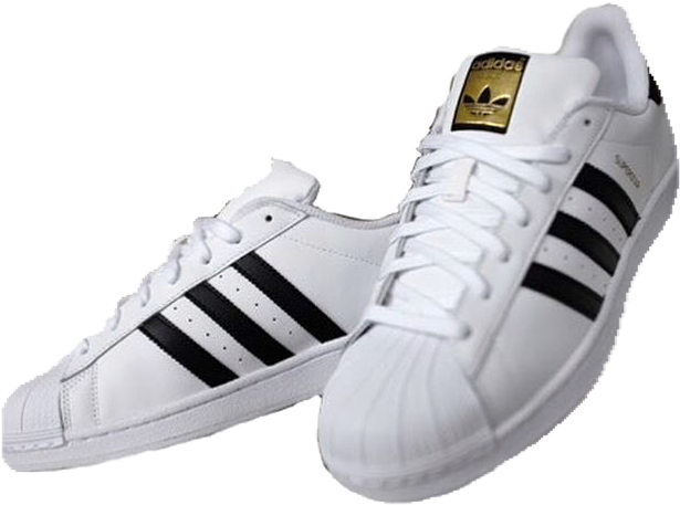 A Pair Of White Shoes With Black Stripes