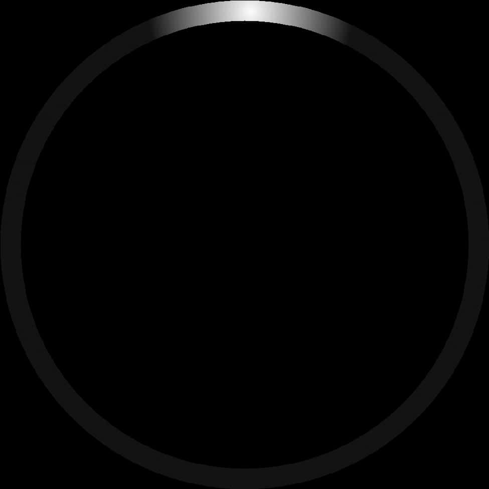 A Black Circle With A Light Shining On It