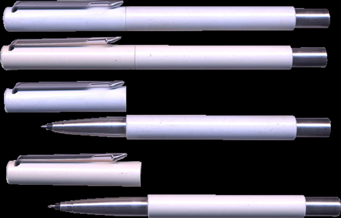A Group Of White Pens