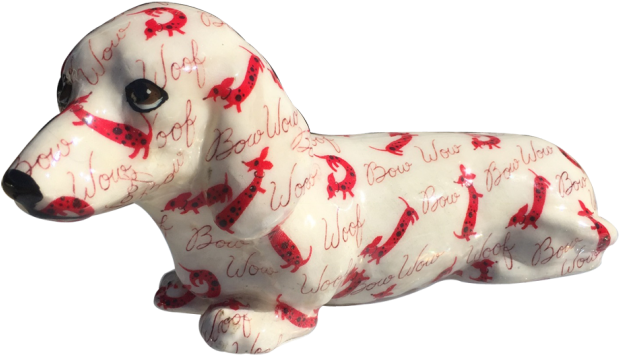 A White And Red Dog Statue