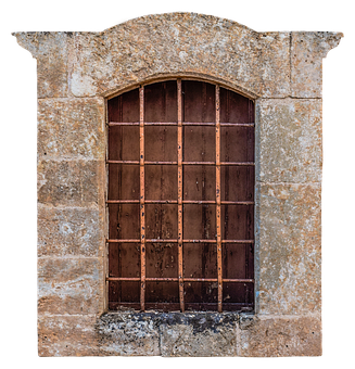 A Window With Bars On A Stone Wall