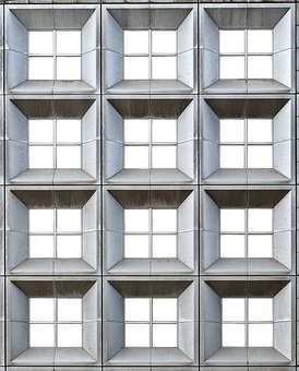 A Wall Of Windows With Square Windows
